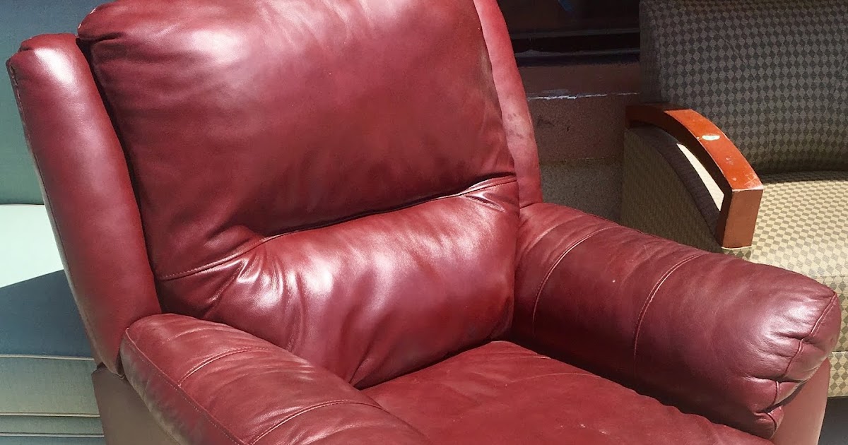 Uhuru Furniture & Collectibles Burgundy Leather Swivel Recliner 175 SOLD
