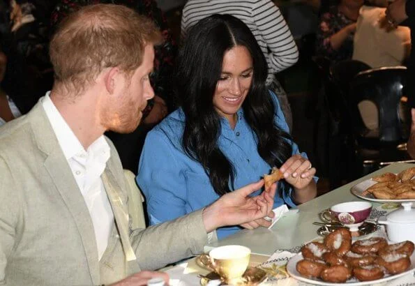 Meghan Markle wore Veronica Beard Sky Blue Cara dress. Duchess is in the same dress she wore on tour in Tonga