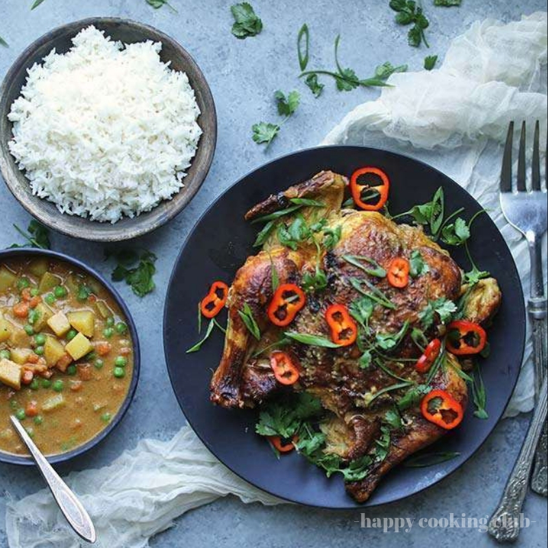 Oven Roasted Whole Curry Chicken with Vegetables and Rice