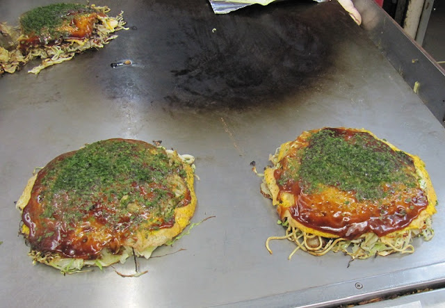 Title: Okonomiyaki in Hiroshima - one of the best food we've ever eaten, Source: own resources, Authors: Agnieszka and Michał Komorowscy