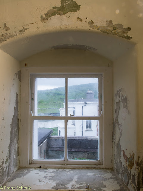 window in Valentia lighthouse staircase view of the lighthous keeper home