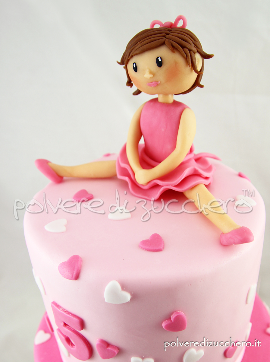 compleanno bimba torta decorata due piani cake design ballerina pasta di zucchero rosa polvere di zucchero