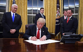 Donald Trump Uses First Act In Oval Office To Sign Cancelation Order On Obamacare