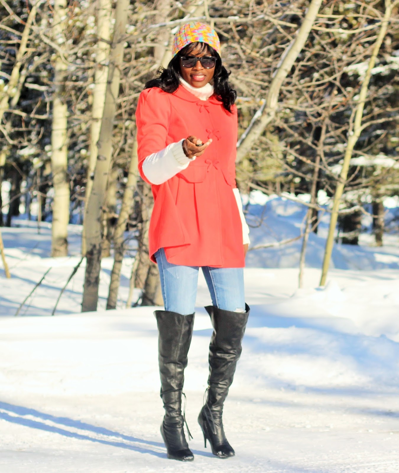 Coat dress styled with over the knee boots