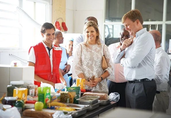 Queen Maxima Jewel wear Mango Floral Earrings, Zara guipure lace top and carried J. Crew Envelope clutch,
