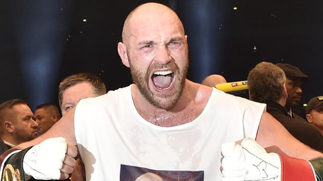 Britain's Tyson Fury celebrates after winning in a world heavyweight title fight.Source:AP