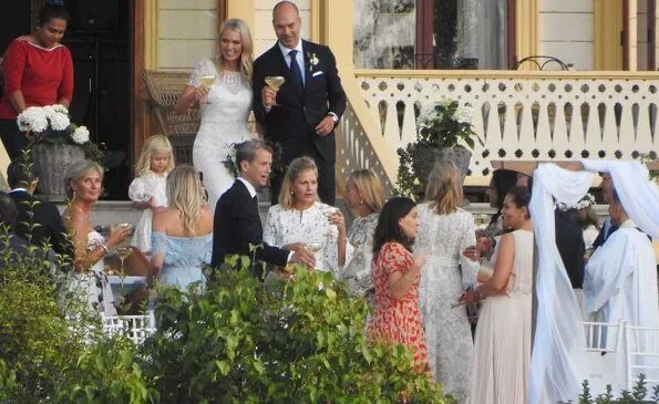 Andrea Brodin wore a wedding gown from By Malina. Princess Victoria wore a pleated dress from HM Conscious Exclusive. Elie Saab and Kreuger