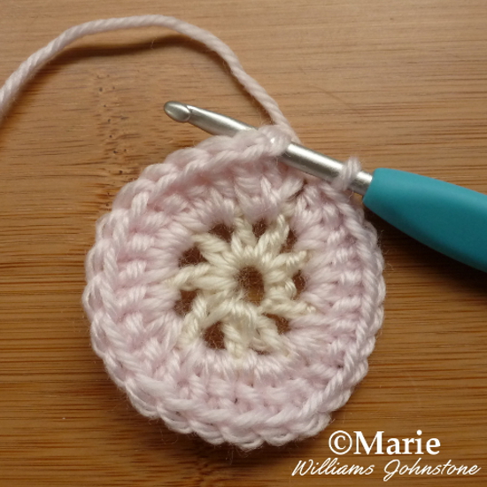 Finishing the second round of the inside circle crochet