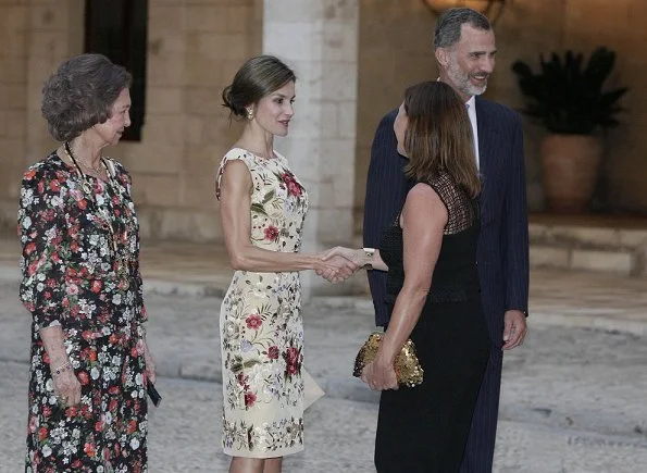 King Felipe and Queen Sofia at Almudaina Palace. Queen Letizia wore a malina print dress and Magrit shoes