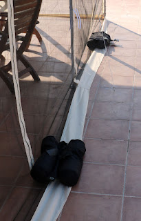 Sandbags to hold down the edges Sandbags to hold down the edges