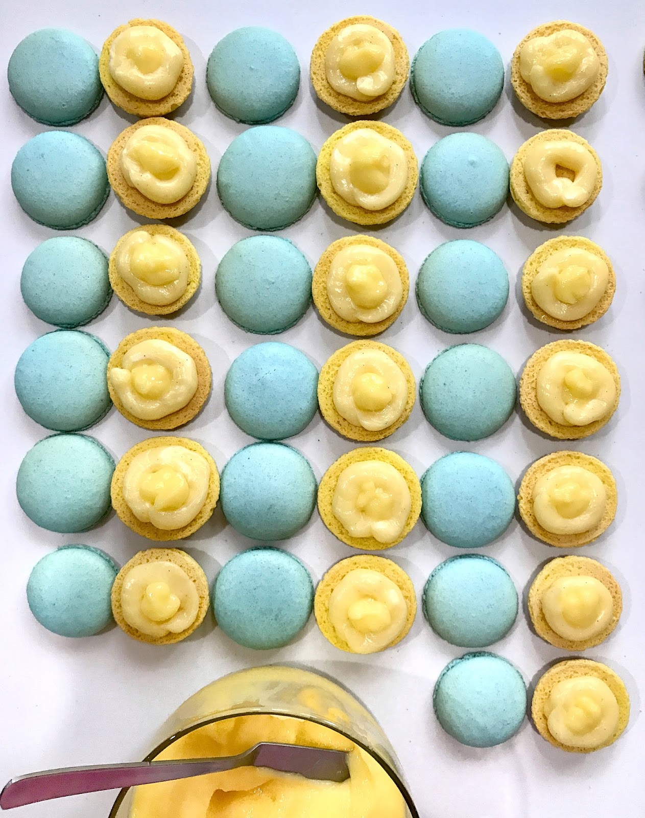 Lemon Curd Macarons filled with tangy lemon curd