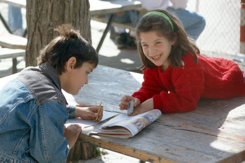 NAMC montessori classroom children with special needs. Girl and boy working on schoolwork