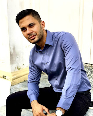 Biodata Fikry Ibrahim Pelakon Drama Encik Imam Ekspress Fikry Ibrahim berpakaian kemeja biru
