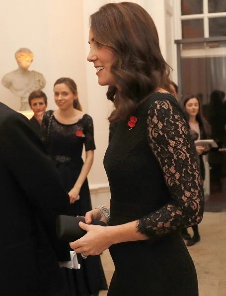 Kate Middleton wore DVF-Diane von Furstenberg Zarita gown. Queen's diamond pendant earrings, Prada clutch