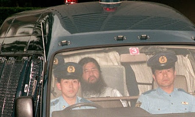 Chizuo Matsumoto, also known as Shoko Asahara, in police van. Chizuo Matsumoto, also known as Shoko Asahara, in police van.