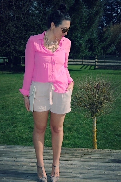 Pink silk Joe Fresh blouse, Lyocell Forever 21 shorts, Jessica Simpson suede T-strap heels and a Target clutch.
