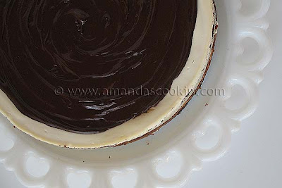 An overhead photo of a chocolate chip ricotta cheesecake.