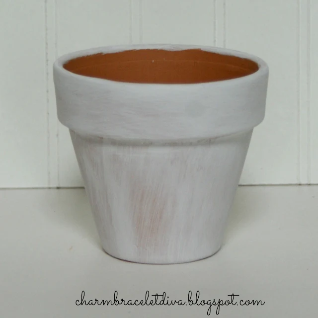clay pot painted with gesso
