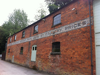 Ghost sign on old merchant's building in Nailsworth, Gloucestershire