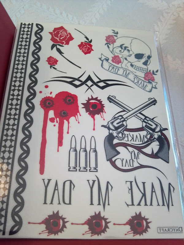 Next we have the SKINZ notebook (A6 size), which features two menacing  title=