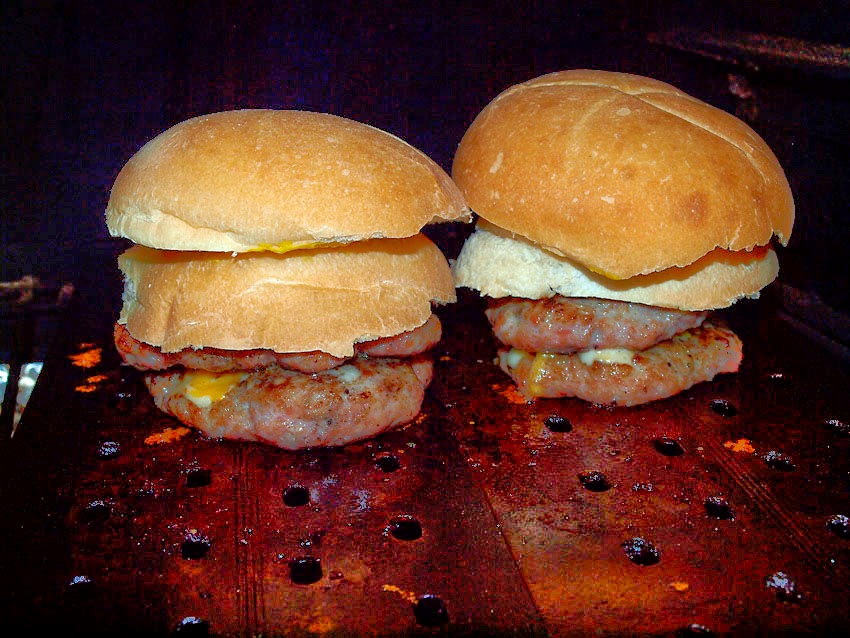 Pellet Smoker Cooking Brat Burgers and Corn on the Cob