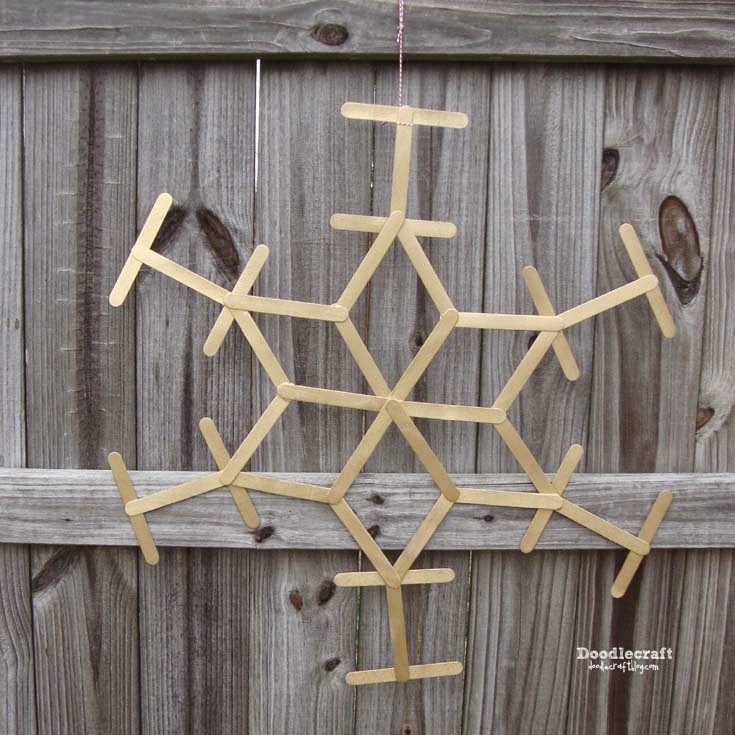Giant Wooden Snowflakes with Pom-Poms! - Design Improvised