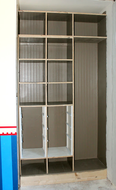 a closet in a boy room is transformed with lots of DIY