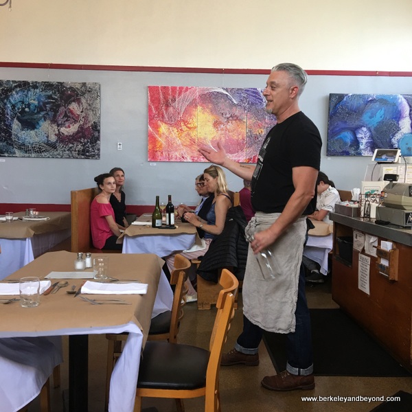 chef Collin Doran describes next course at monthly dinner at Homemade Cafe in Berkeley, California chef Collin Doran describes next course at monthly dinner at Homemade Cafe in Berkeley, California