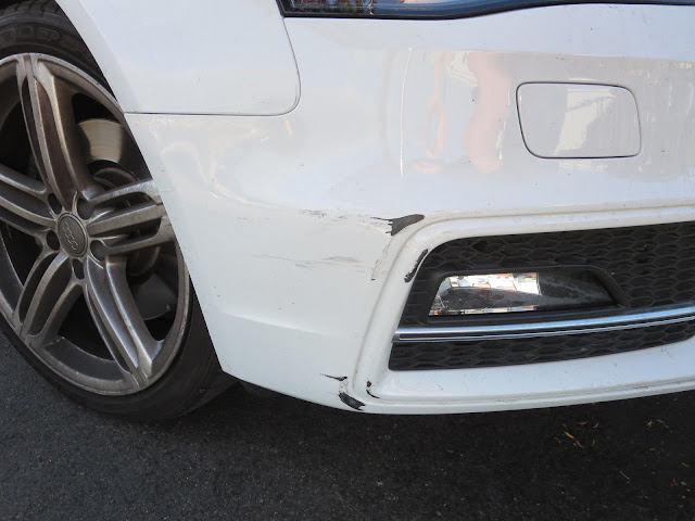 Scratches on bumper of Audi S4 before repairs at Almost Everything Auto Body