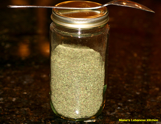 Ground dried mint in jar