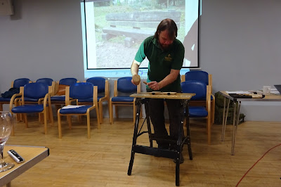 demonstrating woodcarving