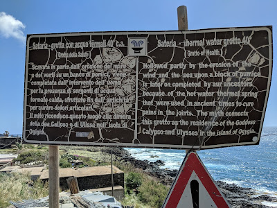 A weathered explanation sign at Grotta Sateria explaining that the water is 40 C - when it's open. A weathered explanation sign at Grotta Sateria explaining that the water is 40 C - when it's open.