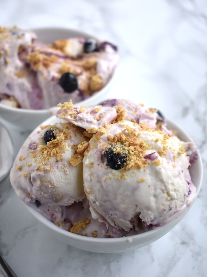 Berry Cheesecake Ice Cream is a healthier frozen yogurt with just 5 ingredients, is packed full of protein with Greek yogurt and tastes like an indulgent dessert with rich cream cheese, berries and graham crackers. www.nutritionistreviews.com