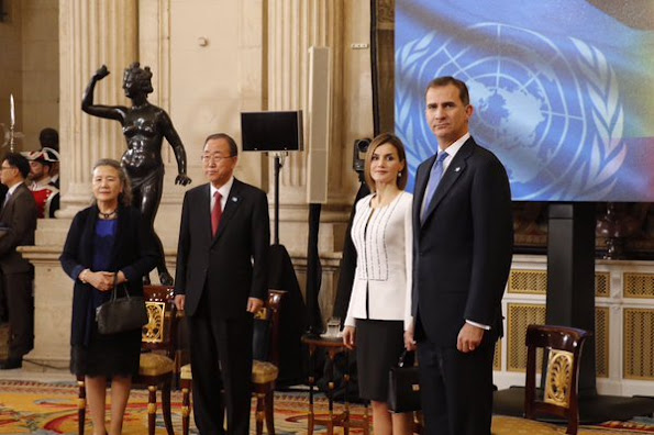 Secretary-General of the United Nations Ban Ki-moon, his wife Yoo Soon-taek Spain's King Felipe VI and Spain's Queen Letizia listen to the Spanish national anthem at the Royal Palace