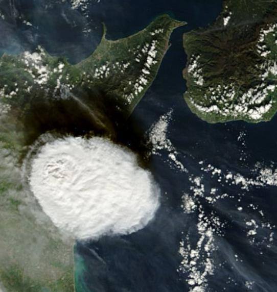 Etna's eruption from Satellite, at right, Calabria, at left, Sicily.
