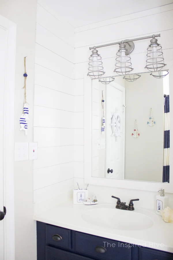 10 beautiful DIY faux shiplap and plank wall bathroom ideas.