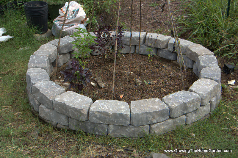 Building a Fall Garden Bed From Stone Retaining Wall Blocks - Growing The Home Garden