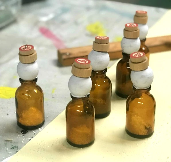 DIY Amber Bottle Snowman Ornaments