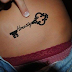 Honesty destiny key tattoo on  belly