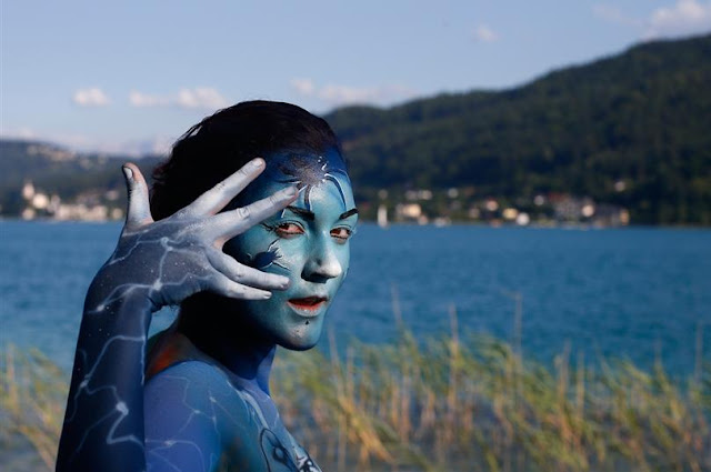 Artist Create Bodypainting Art at the 15th World Bodypainting Festival in Poertschac, Austria