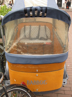 Interior view, padded bench with straps, Babboe cargo bicycle, Amsterdam, The Netherlands