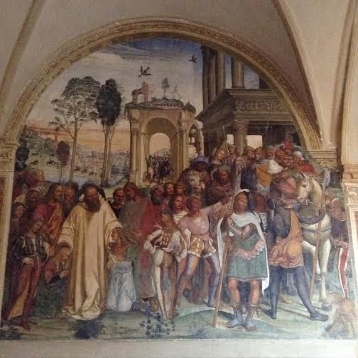 Abbazia Monte Oliveto Maggiore: Chiostro grande, Sodoma; Di come Benedetto riceve li due giovanetti romani Mauro e Placido