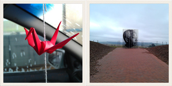 An origami paper crane and the Nelson Mandela monument in KZN