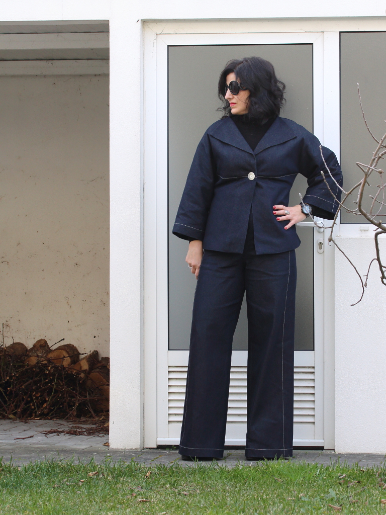 Tany et La Mode Wearing topstitched denim pant suit Unique jacket