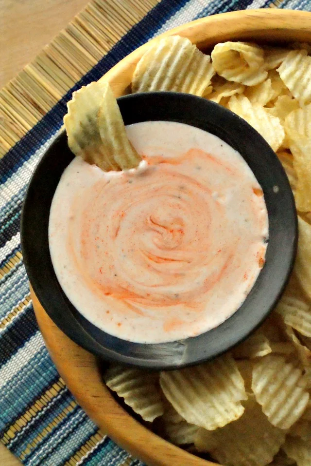 You only need three ingredients to make this cool, creamy, spicy Buffalo Ranch Chip Dip!  Once you start dipping, you won't be able to stop!