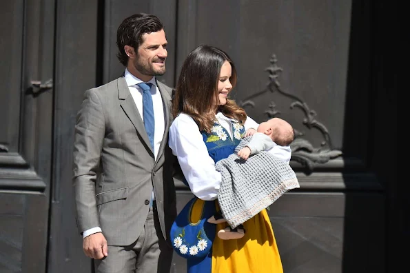 Prince Carl Philip, Princess Sofia Hellqvist and son Prince Alexander open the gate of the Royal Palace for the National Day Celebrations