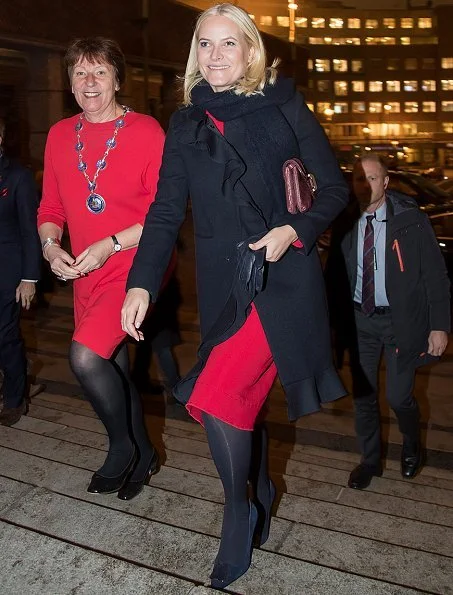 Crown Princess Mette-Marit wore Red valentino Ruffle Coat and Dolce and Gabbana Contrast stitch cady dress