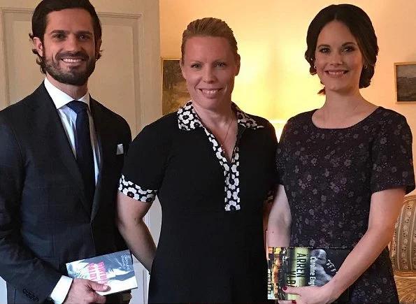 Princess Sofia Hellqvist and Prince Carl Philip met with author Caroline Engvall at Stockholm Royal Palace for Book Fair 2017