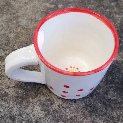 red polka dots on back of fox mug