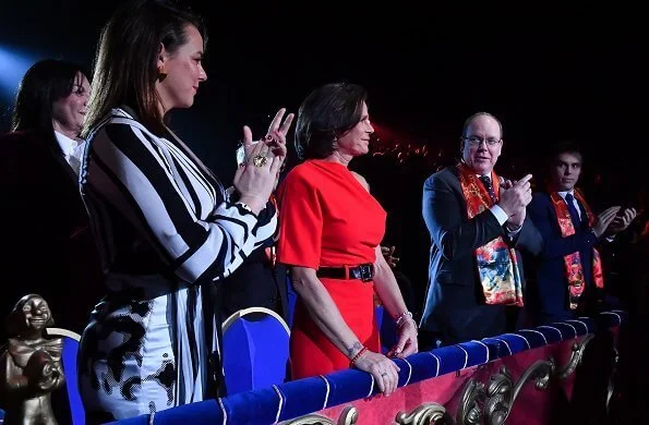 Princess Stephanie of Monaco, Pauline Ducruet, Louis Ducruet and his wife Marie Ducruet. red one-shoulder jumpsuit half sleeve